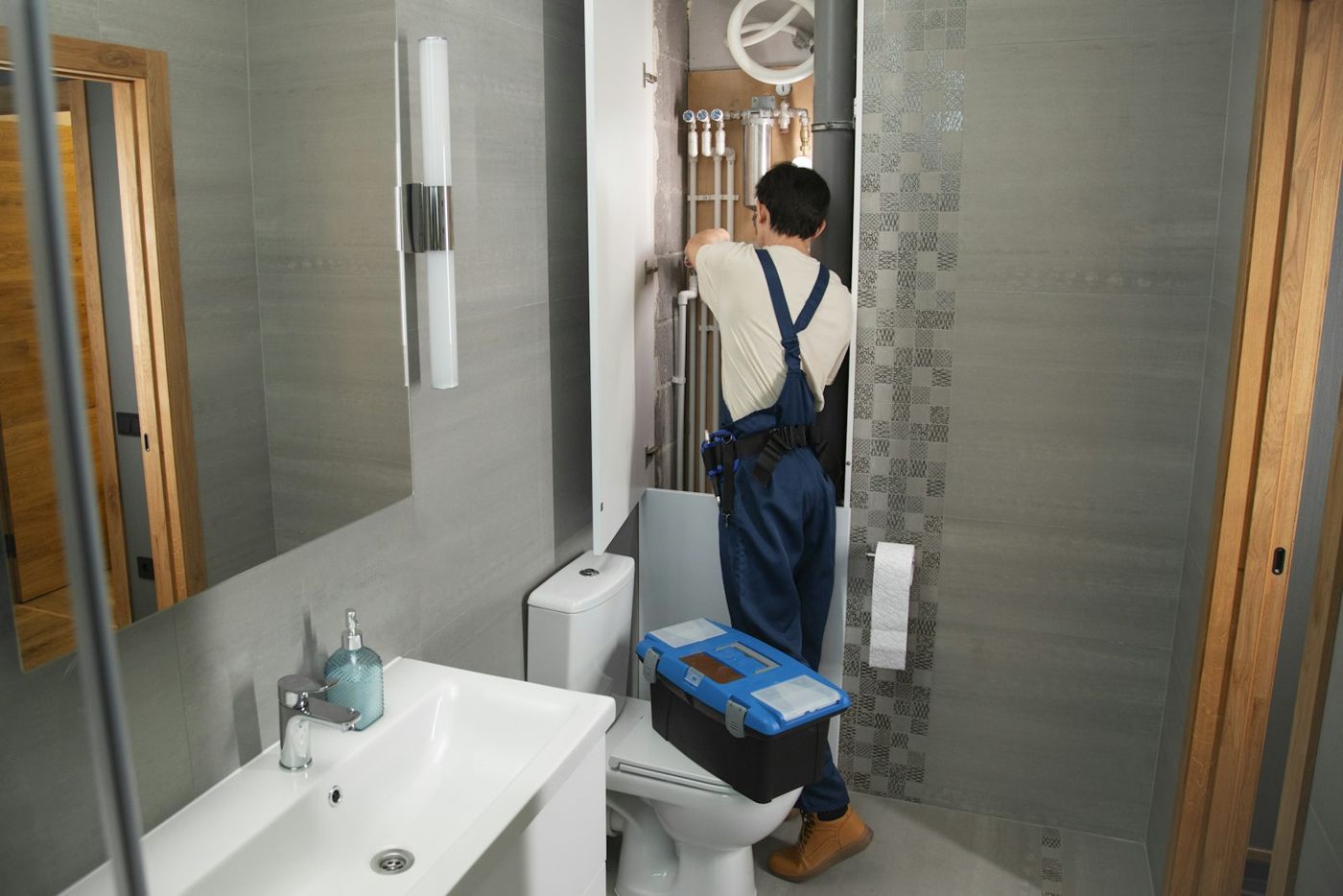 Tech working on a bathroom radiator