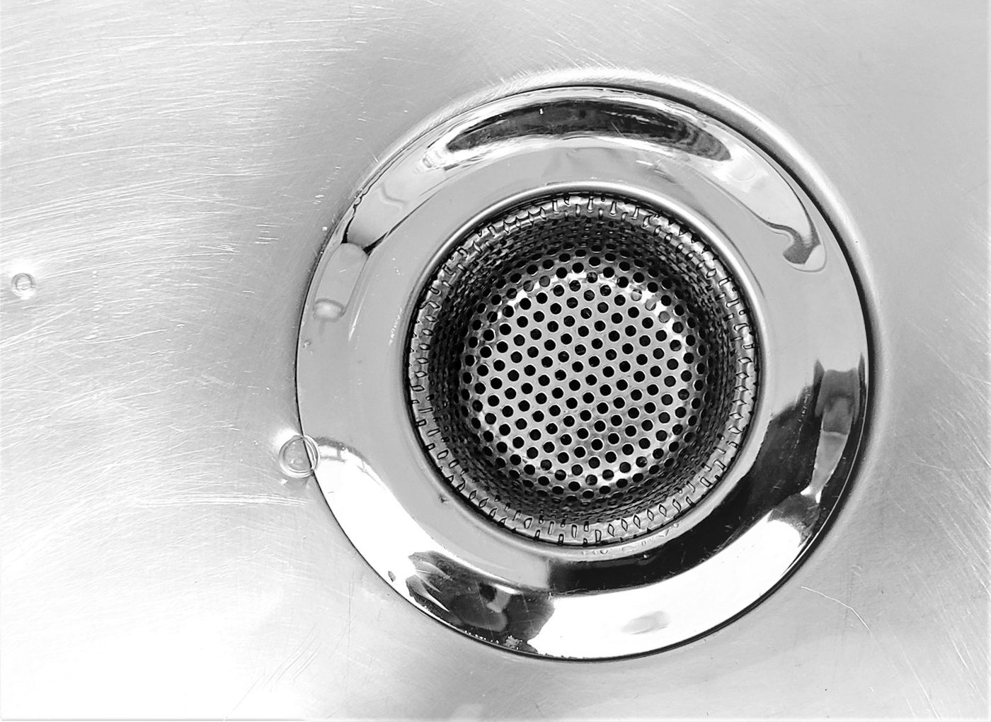 A stainless steel sink drain